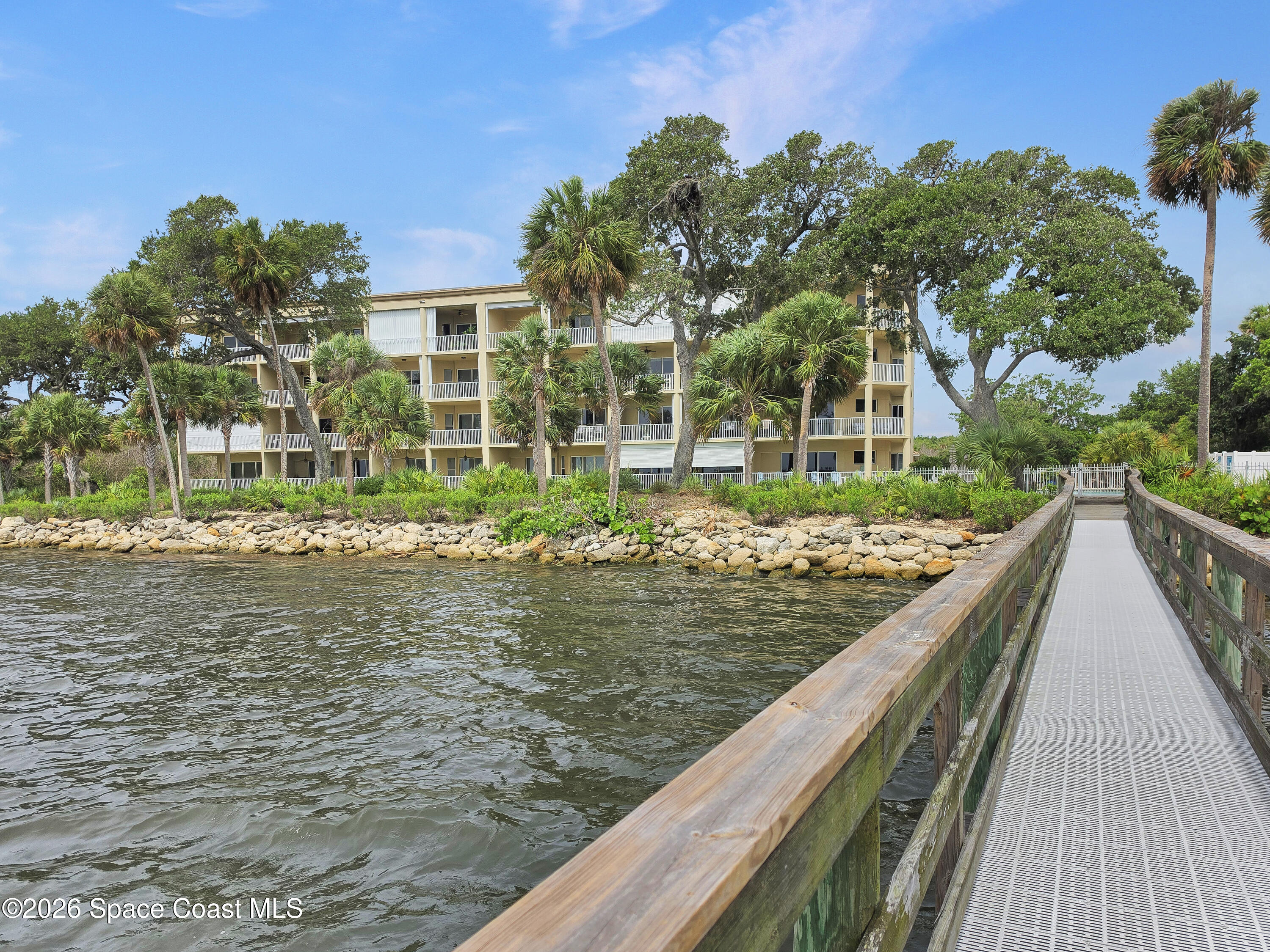6005 Highway 1, Unit 101 Rockledge, FL 32955 - Photo 44 of 57 a view of a house with a yard