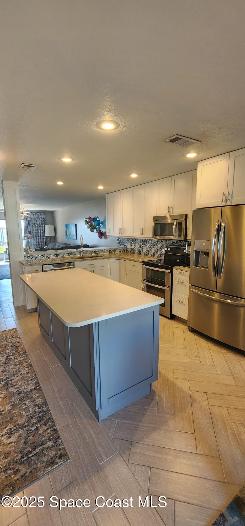 2880 South Atlantic Avenue, Unit 102 Cocoa Beach, FL 32931 - Photo 4 of 31 20250616_164224_resized