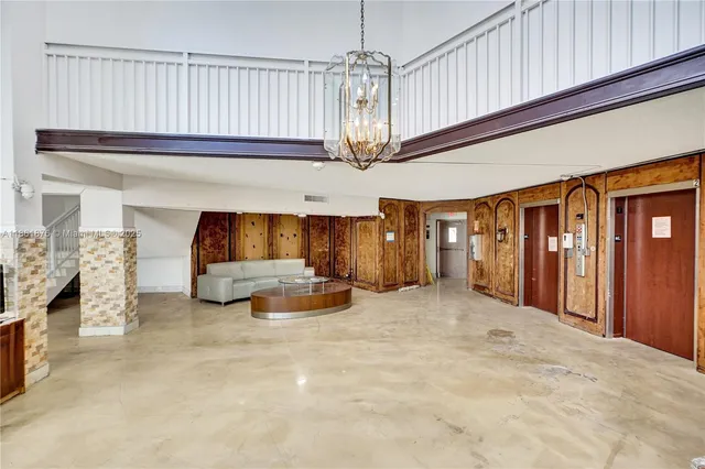 a view of livingroom with furniture and a flat screen tv