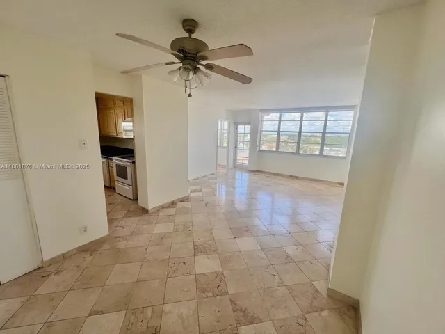 a view of an empty room and window