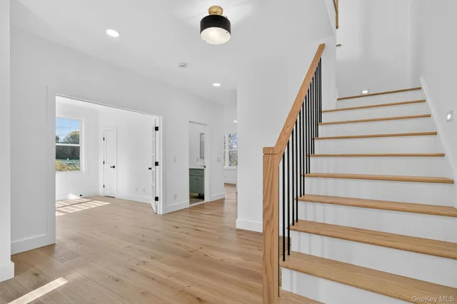 a view of entryway with wooden floor