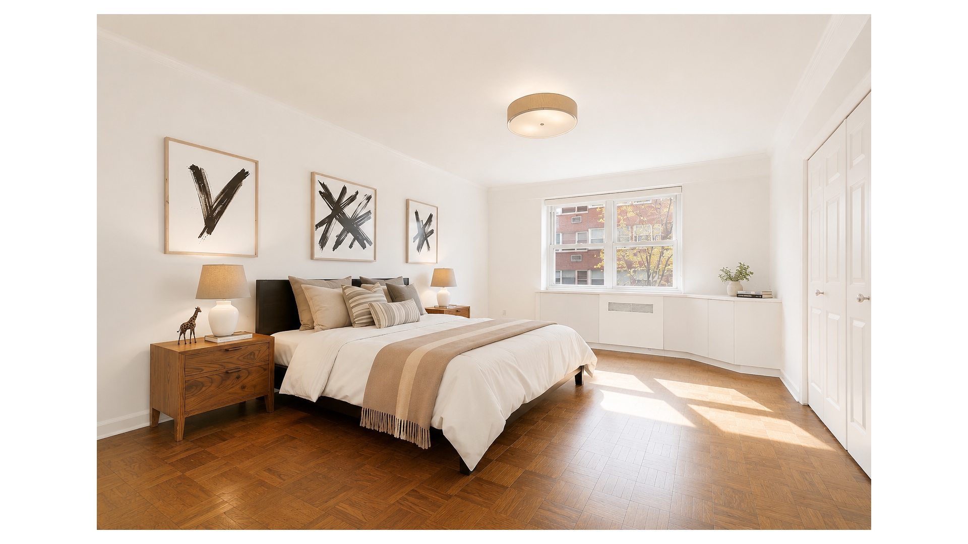 233 East 69th Street, Unit 3L Manhattan, NY 10021 - Photo 5 of 9 a spacious bedroom with a bed and a window