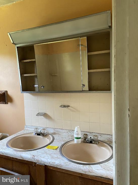 25 Fran Avenue Ewing, NJ 08618 - Photo 19 of 21 a bathroom with a sink and a mirror