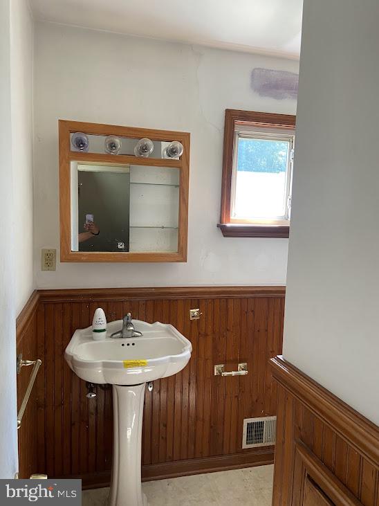 25 Fran Avenue Ewing, NJ 08618 - Photo 21 of 21 a bathroom with a sink and a mirror