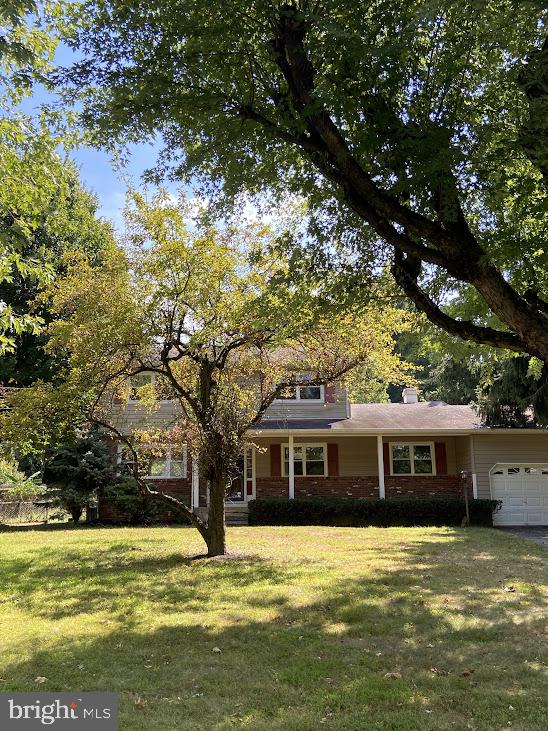 25 Fran Avenue Ewing, NJ 08618 - Photo 7 of 21 a front view of a house with a yard
