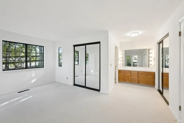 a view of an empty room and window