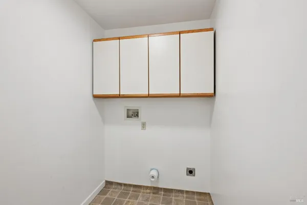 a view of a room with racks on the wall