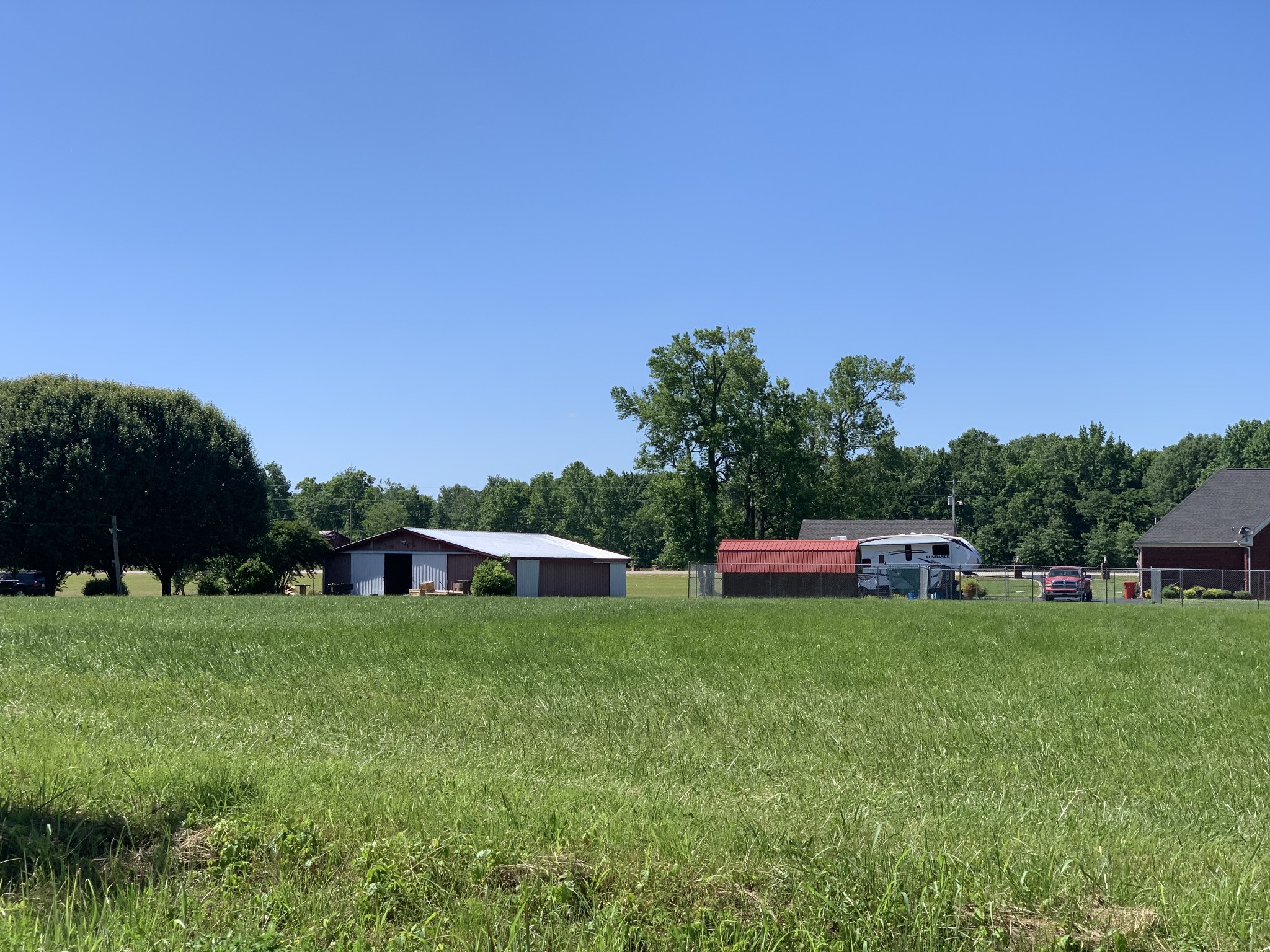 7 Red Boiling Springs Road Lafayette, TN 37083 - Photo 2 of 3 a view of a house with a park