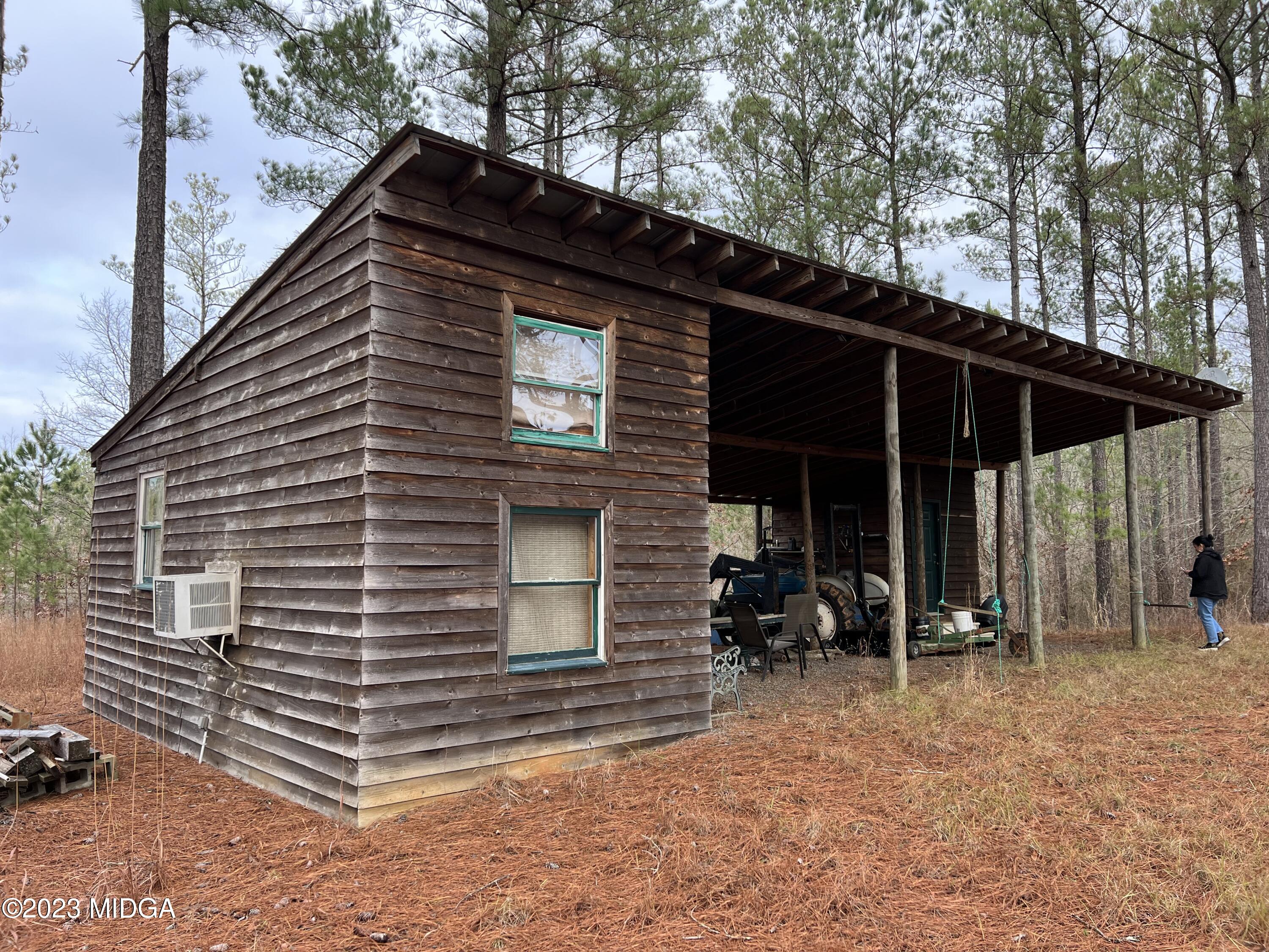 0 Forest Service Road Monticello, GA 31064 - Photo 23 of 32 a view of house with chair and tables