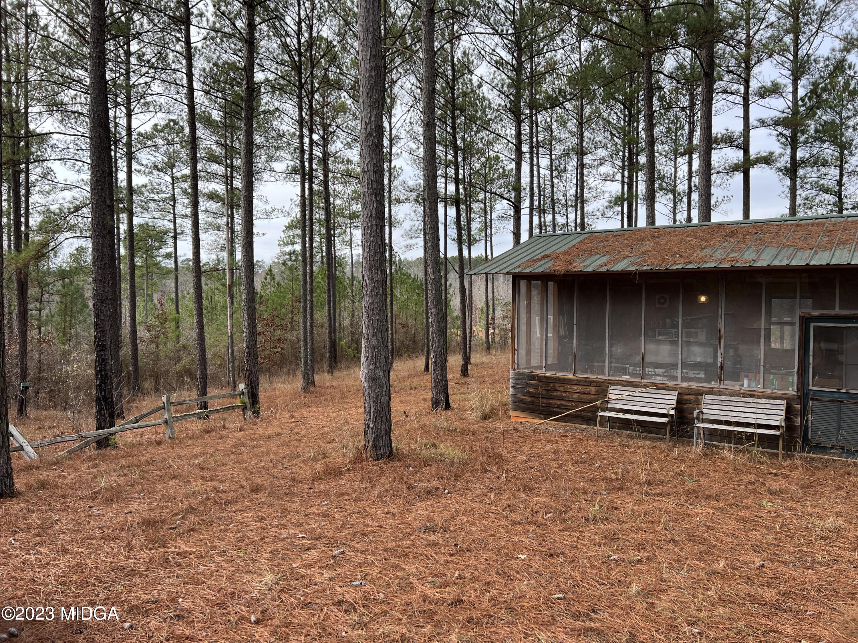 0 Forest Service Road Monticello, GA 31064 - Photo 5 of 32 a backyard of a house with barbeque oven