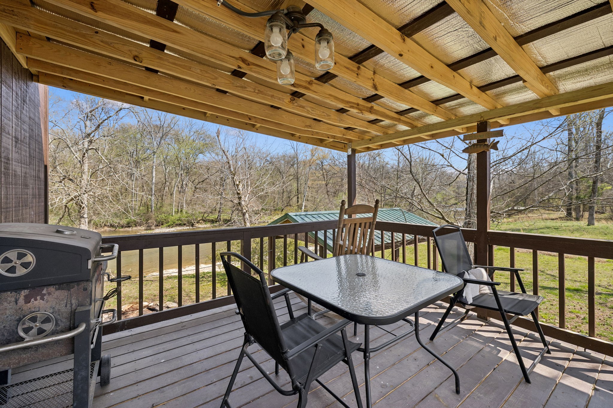 506 Tablerock Road Hohenwald, TN 38462 - Photo 21 of 64 a view of a balcony with furniture