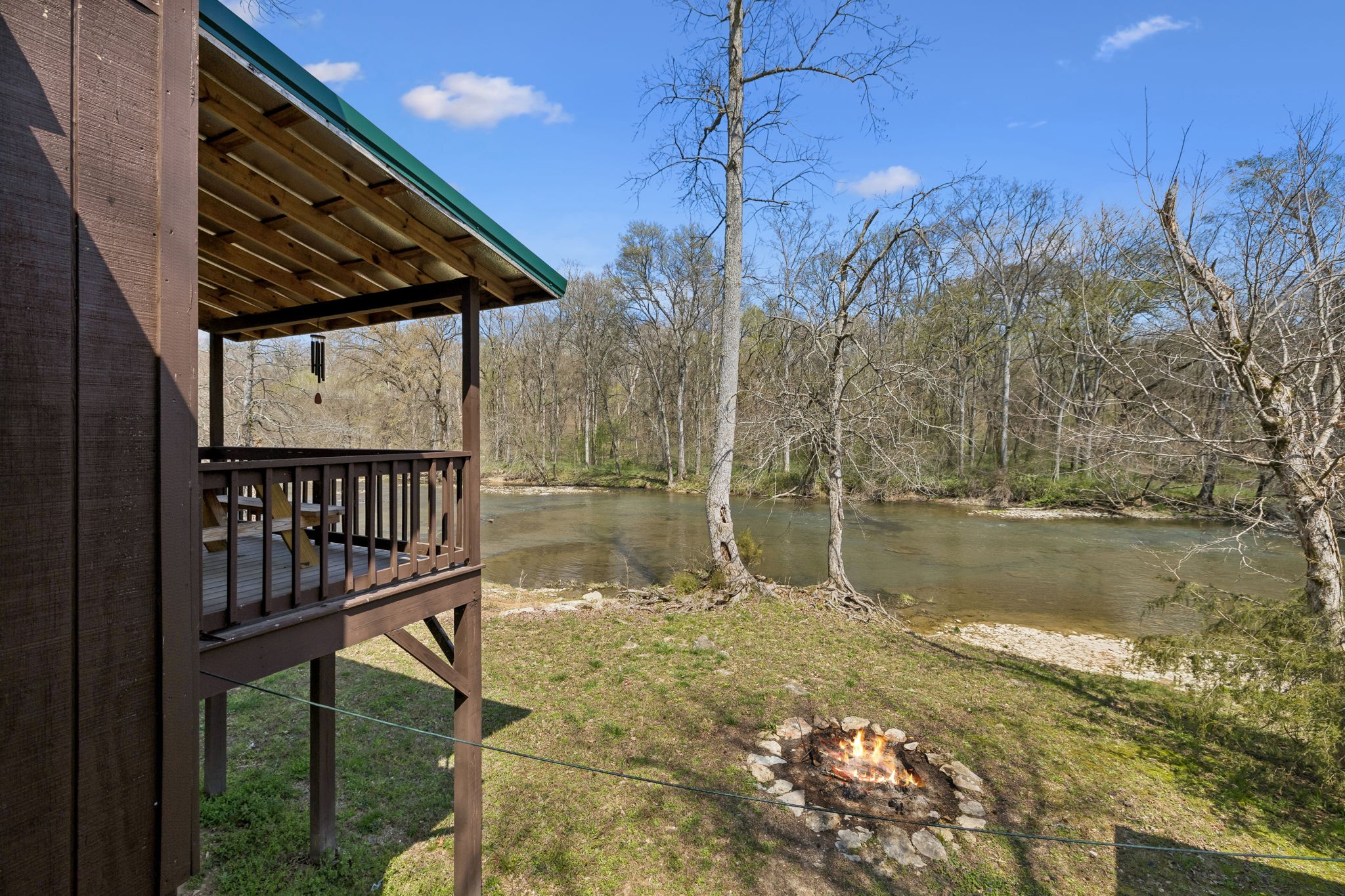 506 Tablerock Road Hohenwald, TN 38462 - Photo 22 of 64 a view of a lake from a balcony
