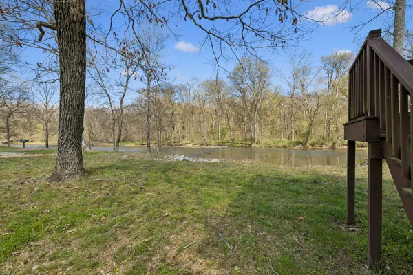 a view of a two chairs on the roof deck