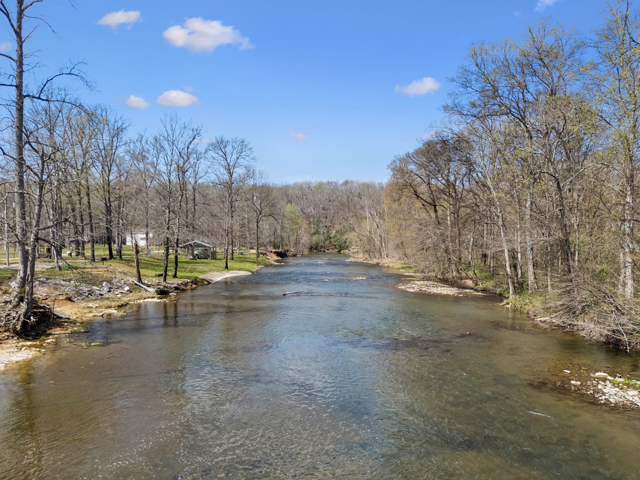 506 Tablerock Road Hohenwald, TN 38462 - Photo 42 of 64 a view of a street with trees and houses