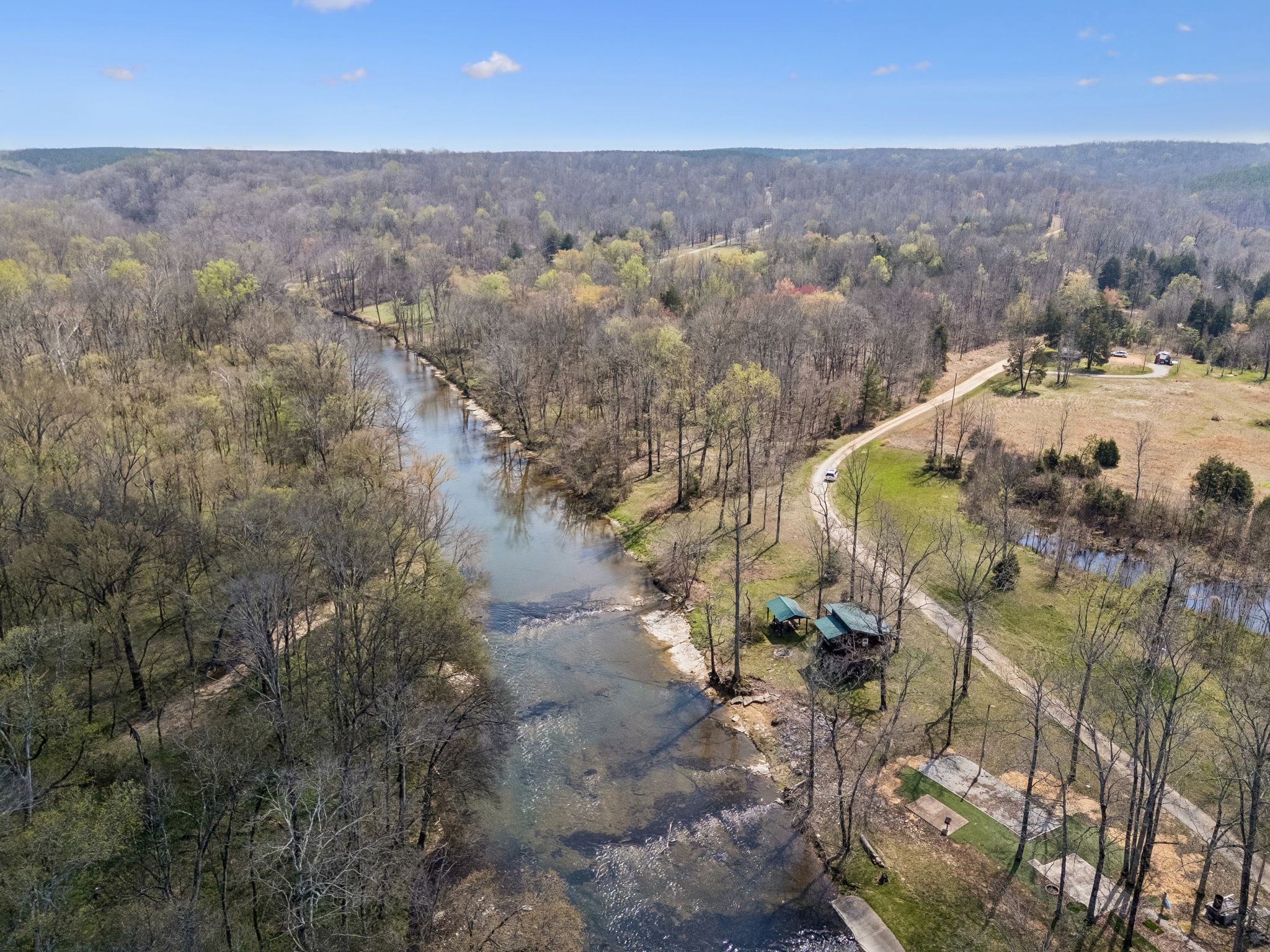 506 Tablerock Road Hohenwald, TN 38462 - Photo 54 of 64 an aerial view of a house with a yard