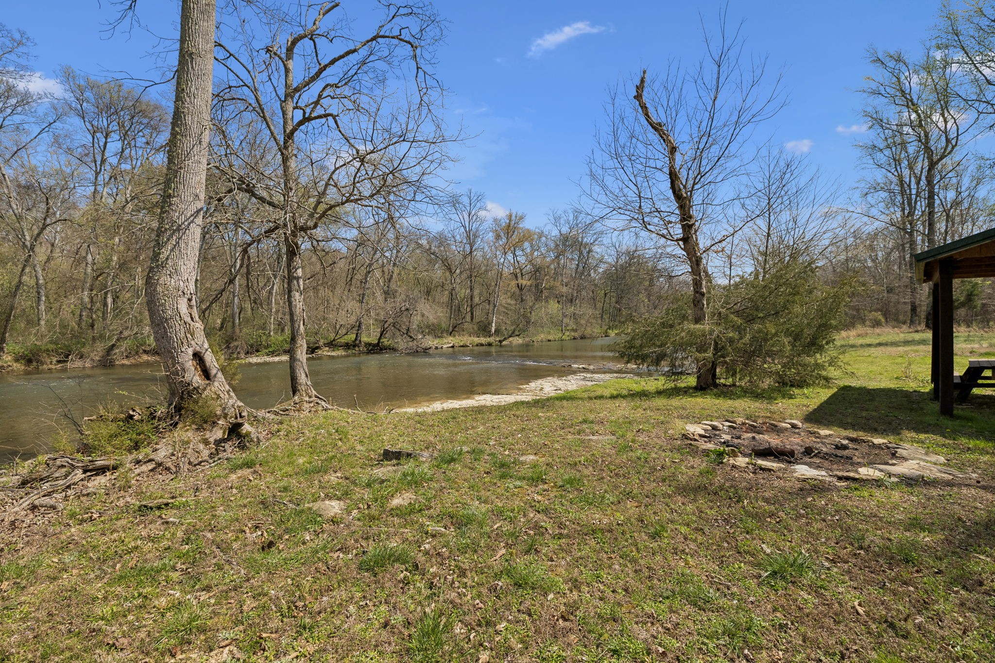 506 Tablerock Road Hohenwald, TN 38462 - Photo 7 of 64 a view of backyard with wooden fence