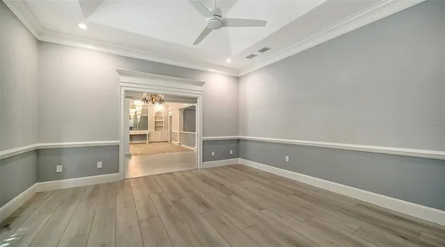 a view of a backyard with a swimming pool