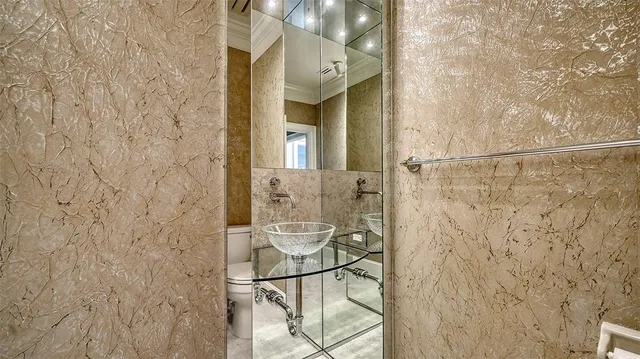 a view of front door of house with outdoor seating