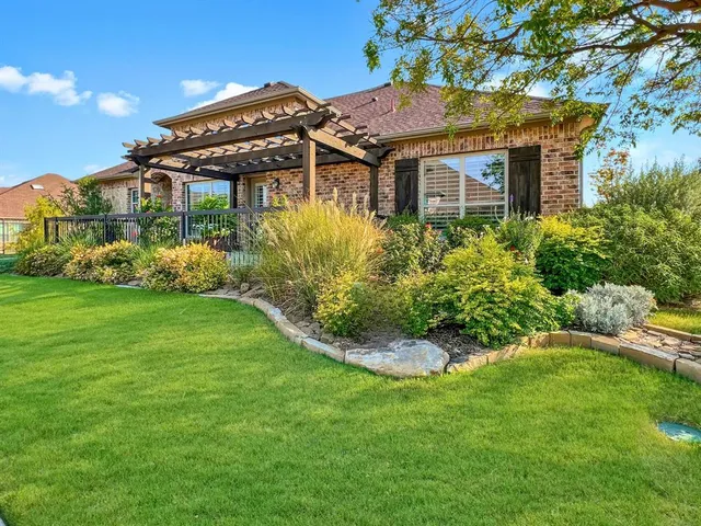 a view of a house with garden