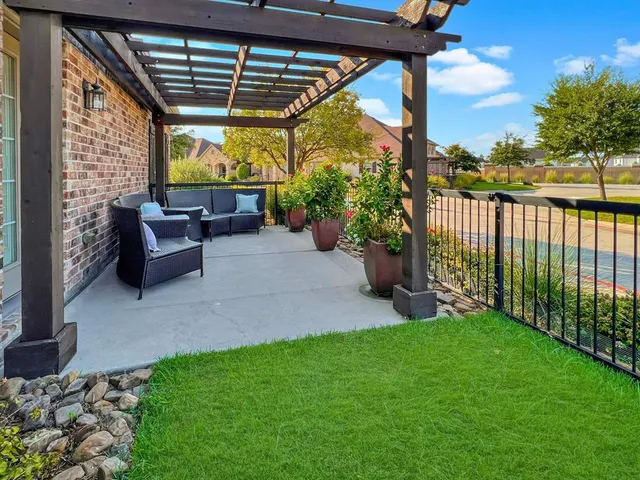 a garden view with a seating space