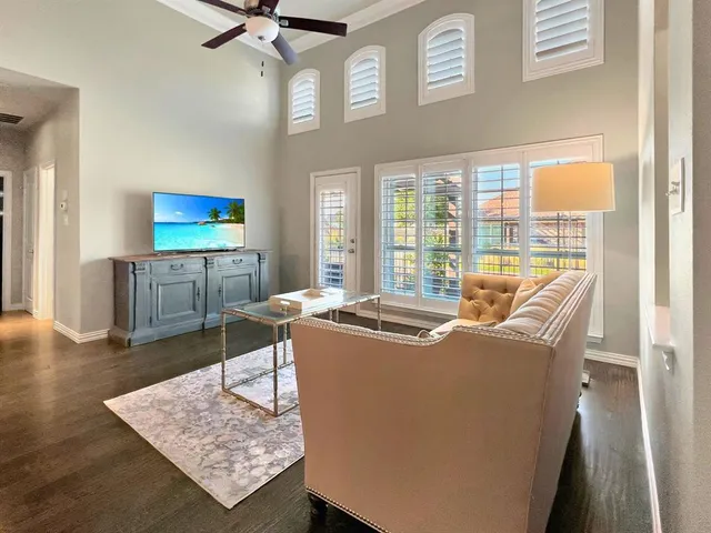 a living room with furniture and a table