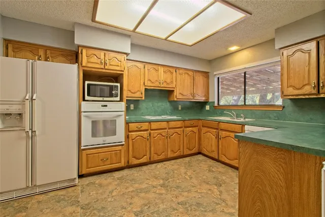 a view of livingroom with kitchen