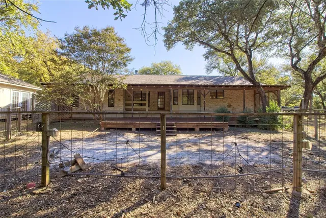 a view of a yard with tree s