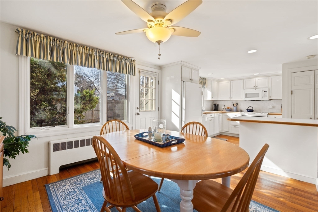 27 Cornell Road Marblehead, MA 01945 - Photo 11 of 34 a dining room with furniture a chandelier and wooden floor