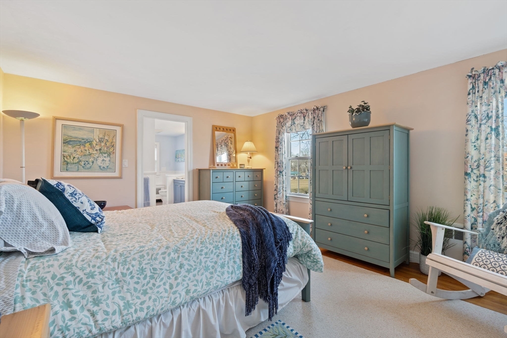 27 Cornell Road Marblehead, MA 01945 - Photo 17 of 34 a bedroom with a bed and a dresser