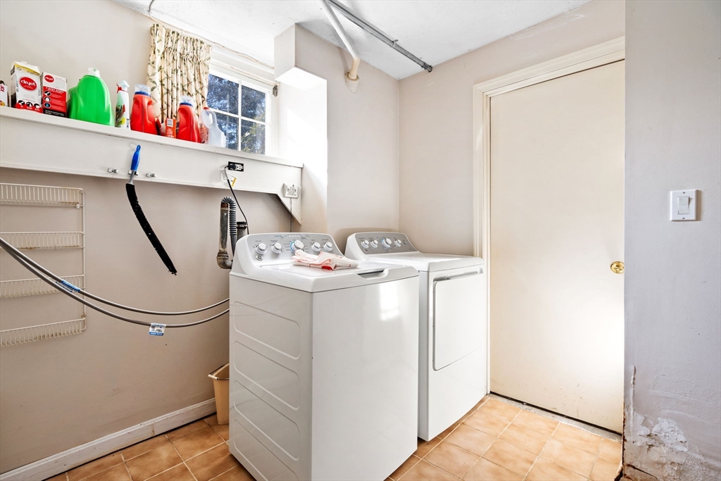 27 Cornell Road Marblehead, MA 01945 - Photo 28 of 34 a utility room with dryer and washer