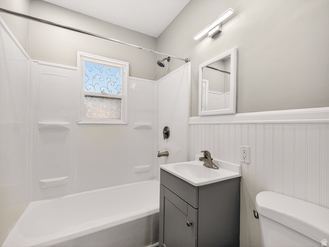 74 South 300 East Springville, UT 84663 - Photo 16 of 48 Modern bathroom featuring a white bathtub/shower combination with dark bronze fixtures
