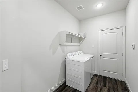 a bathroom with a sink toilet and tub