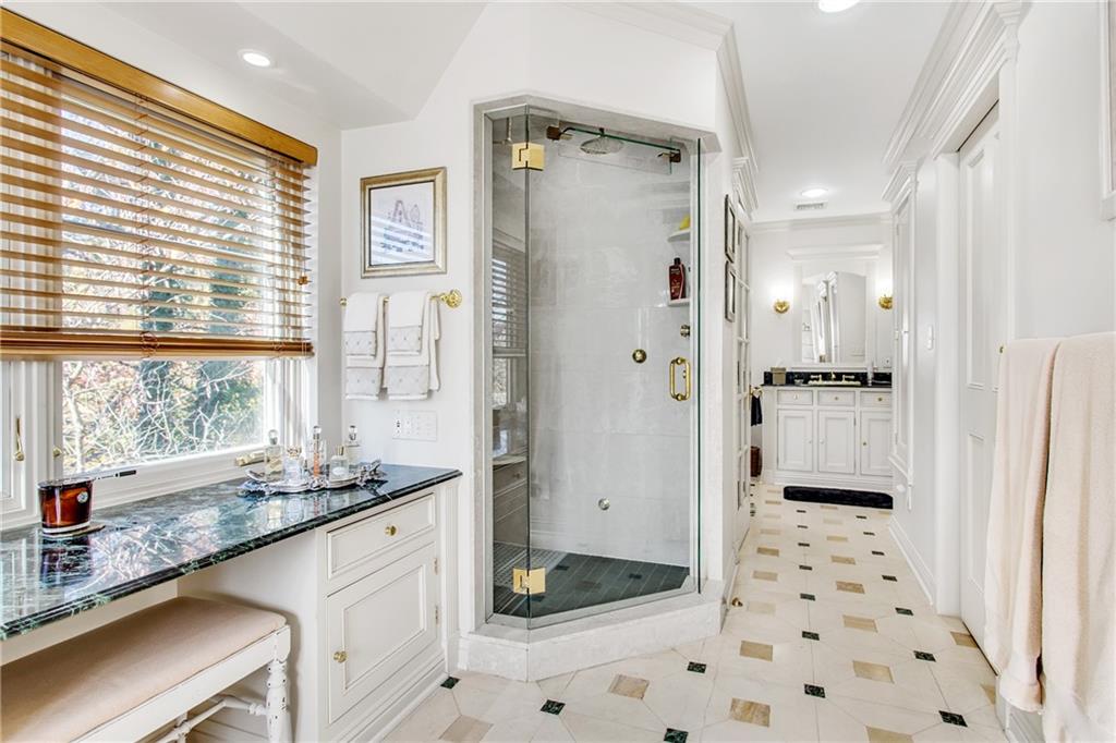 213 Hampton Road Pittsburgh, PA 15215 - Photo 20 of 21 a bathroom with a granite countertop sink a large mirror and a shower