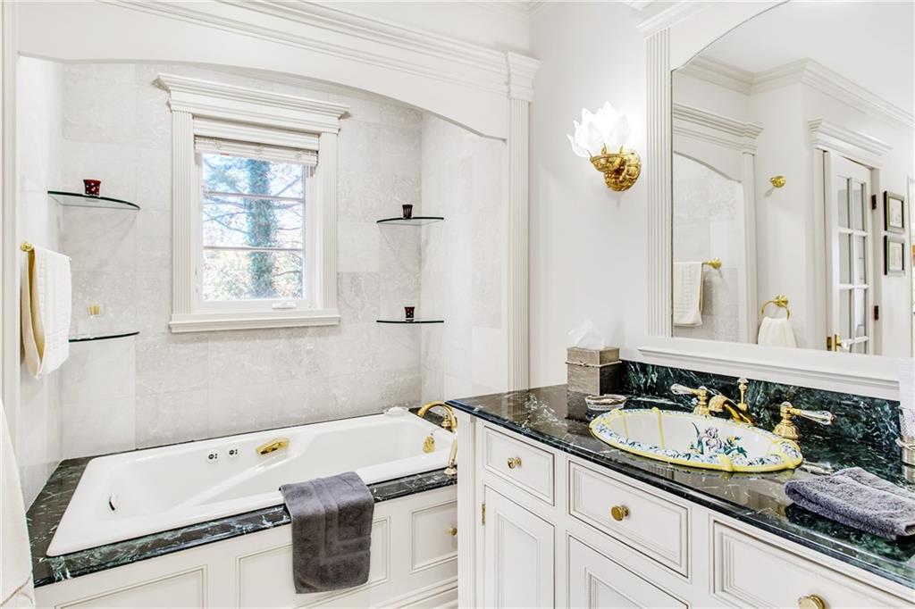 213 Hampton Road Pittsburgh, PA 15215 - Photo 21 of 21 a bathroom with a granite countertop sink and a mirror