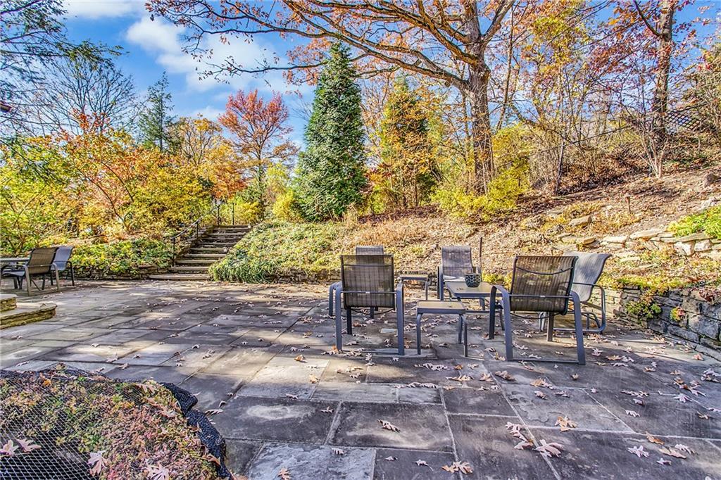 213 Hampton Road Pittsburgh, PA 15215 - Photo 10 of 21 a view of a patio with table and chairs and potted plants