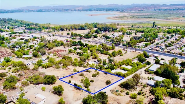 a view of a road with mountains in the background