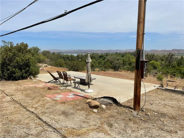 a view of a yard with an outdoor space