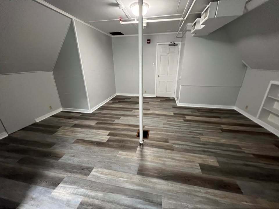 220 College Avenue, Unit 2 DeKalb, IL 60115 - Photo 14 of 14 a view of a livingroom with wooden floor