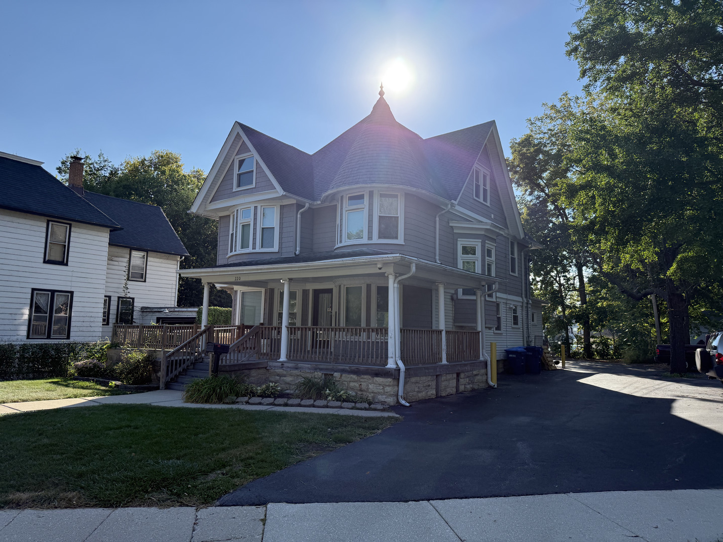 220 College Avenue, Unit 2 DeKalb, IL 60115 - Photo 2 of 14 a front view of a house with a garden