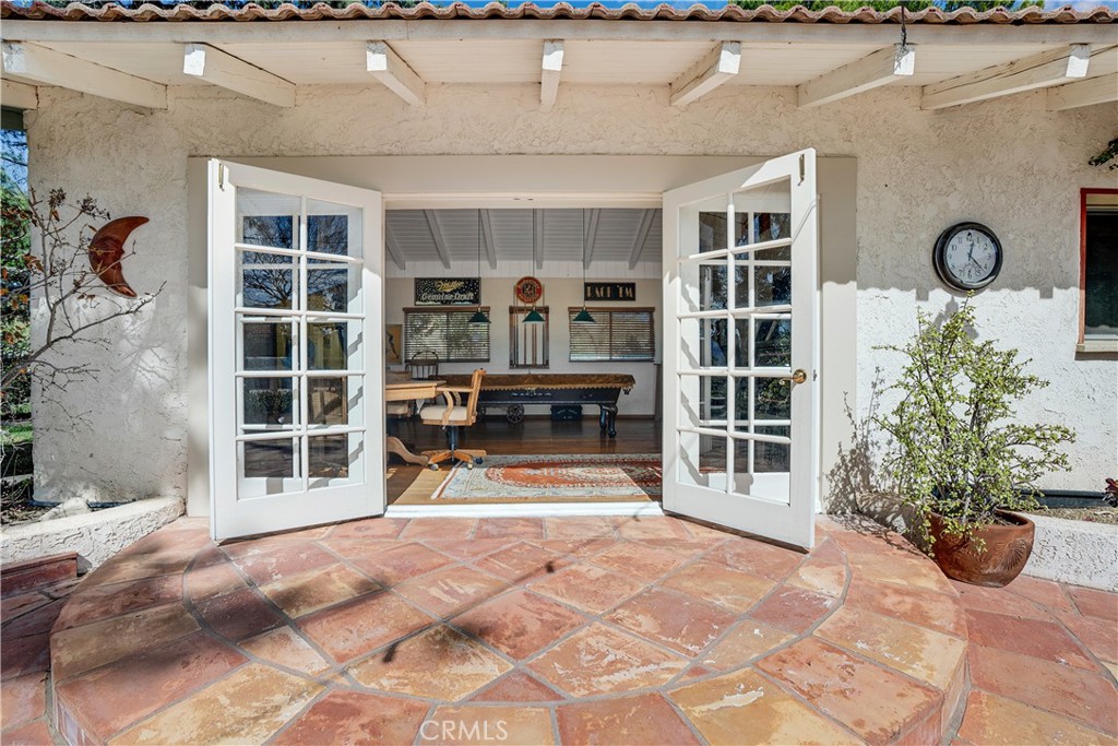 30334 Byfield Road Castaic, CA 91384 - Photo 38 of 48 Double doors from game room to patio
