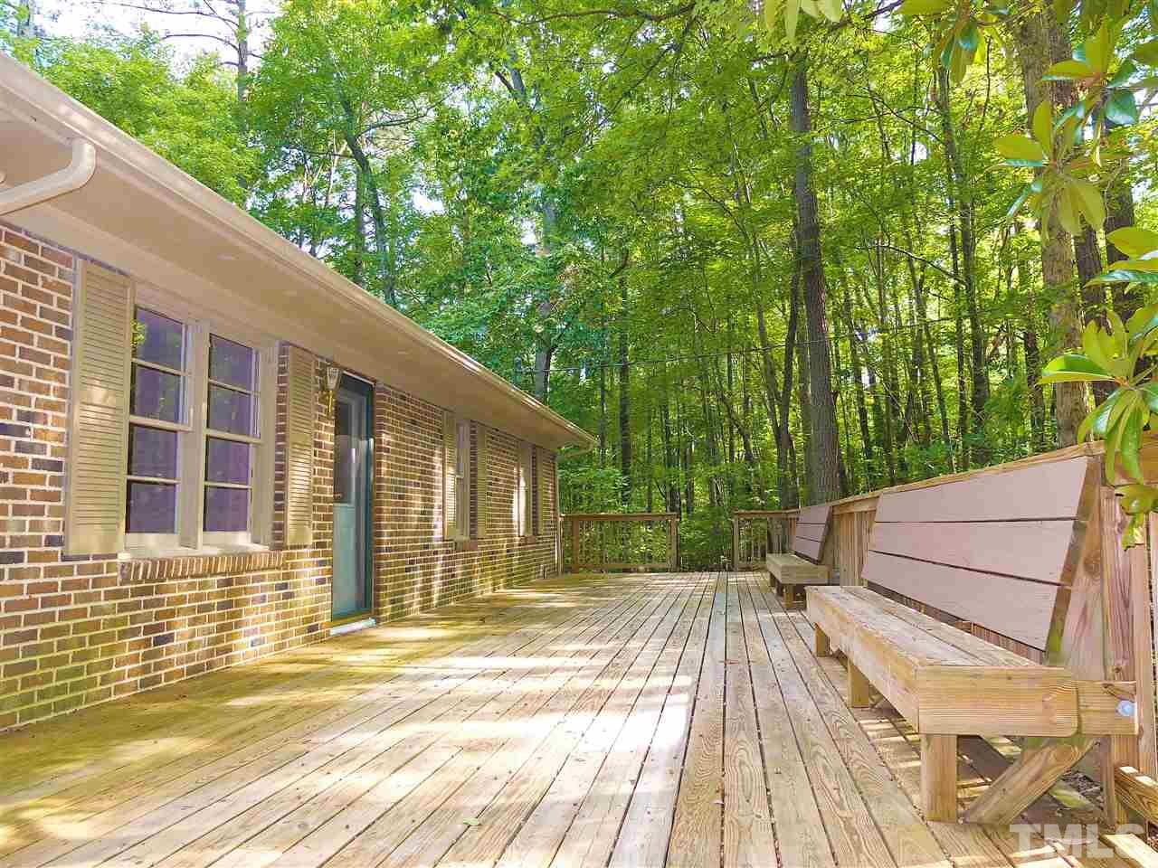 6808 Laurdane Road Raleigh, NC 27613 - Photo 11 of 25 a view of a house with a patio