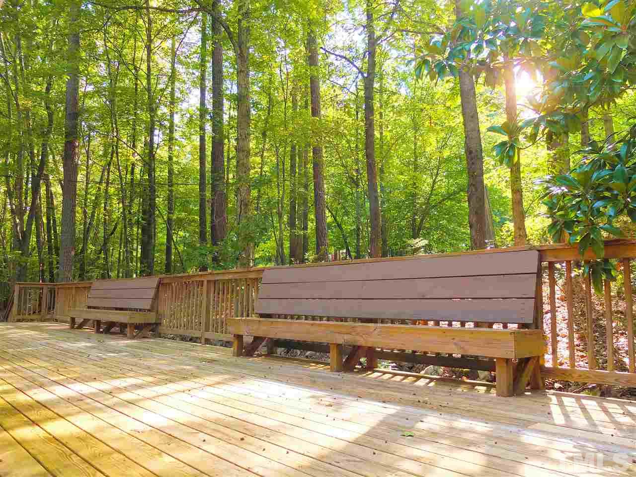 6808 Laurdane Road Raleigh, NC 27613 - Photo 13 of 25 a view of patio with a bench