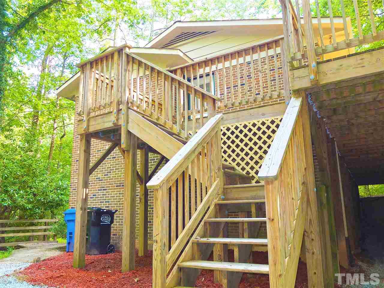 6808 Laurdane Road Raleigh, NC 27613 - Photo 14 of 25 a front view of a house