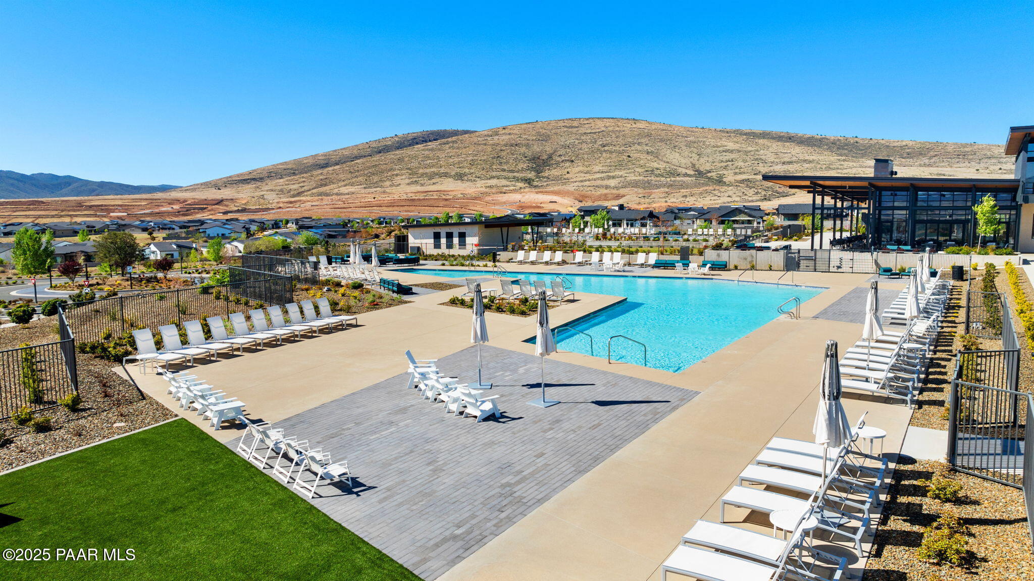5902 Finch Place Prescott Valley, AZ 86314 - Photo 113 of 116 a view of a swimming pool with lounge chairs