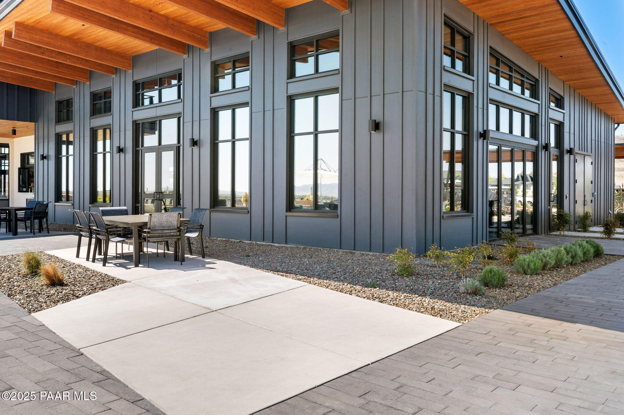 5902 Finch Place Prescott Valley, AZ 86314 - Photo 42 of 116 a building exterior with furniture and outdoor space