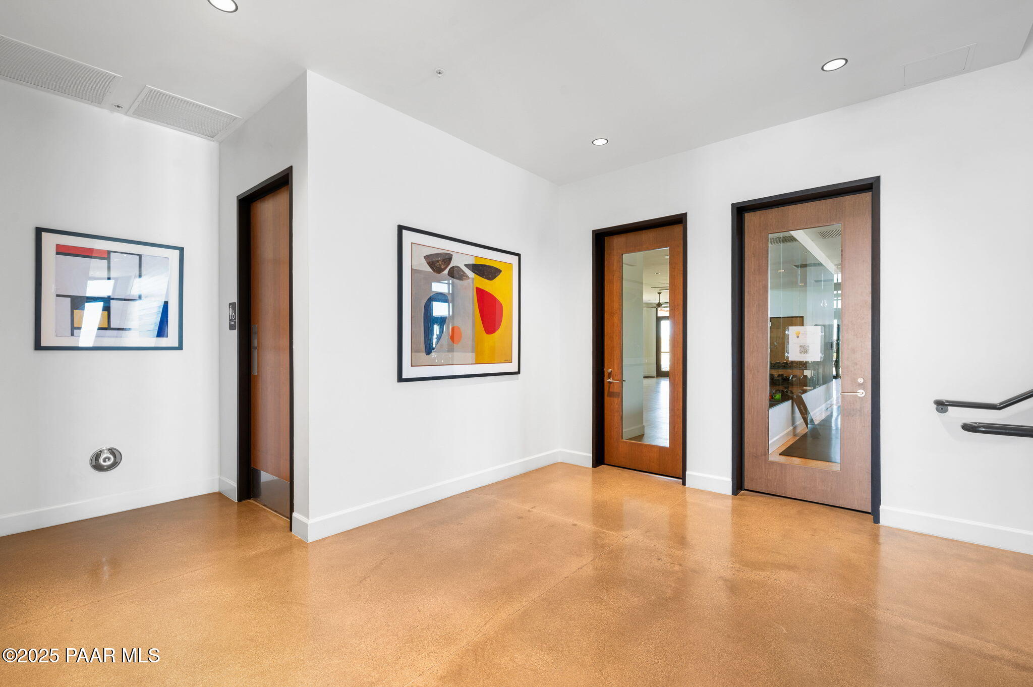 5902 Finch Place Prescott Valley, AZ 86314 - Photo 56 of 116 a view of an empty room with closet and wooden floor