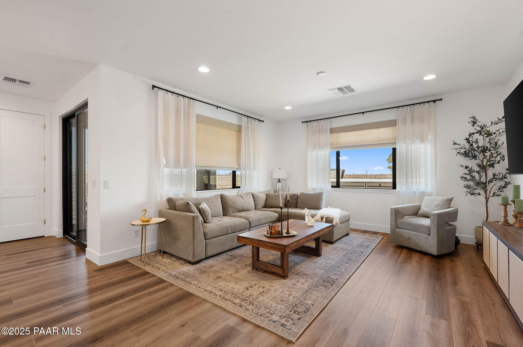 5902 Finch Place Prescott Valley, AZ 86314 - Photo 6 of 116 a living room with furniture and a wooden floor