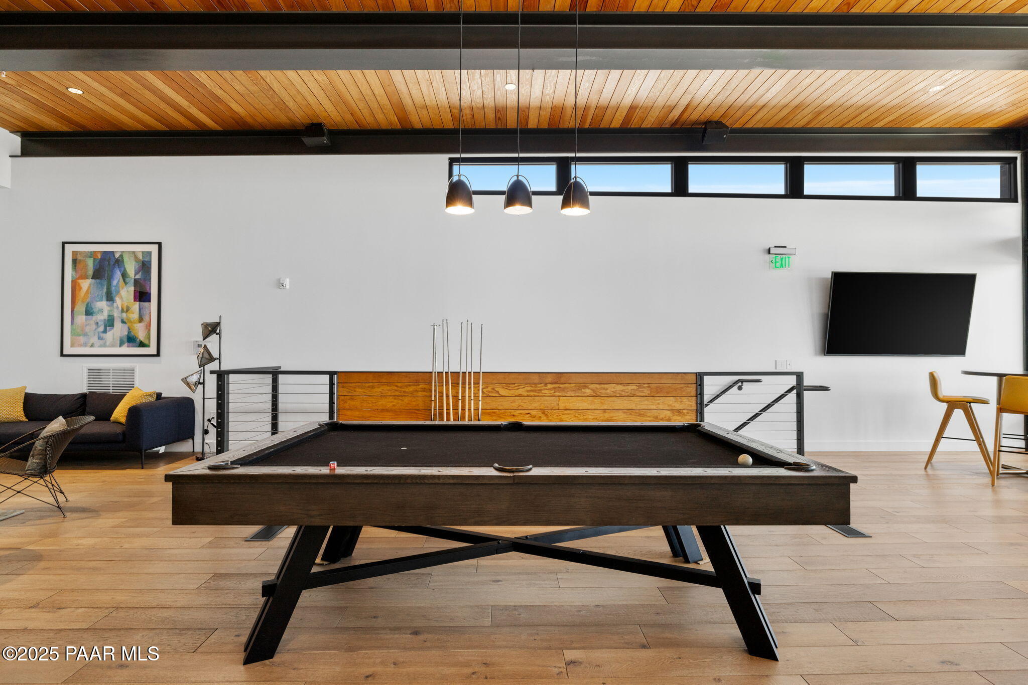 5902 Finch Place Prescott Valley, AZ 86314 - Photo 68 of 116 a living room with a table and a flat screen tv
