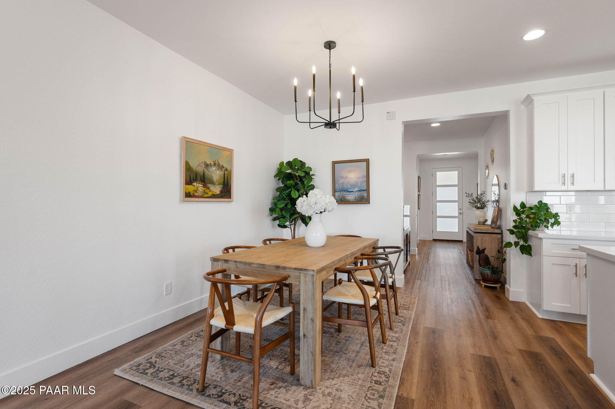 5902 Finch Place Prescott Valley, AZ 86314 - Photo 9 of 116 a view of a dining room with furniture and wooden floor