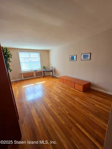 a view of a balcony with furniture